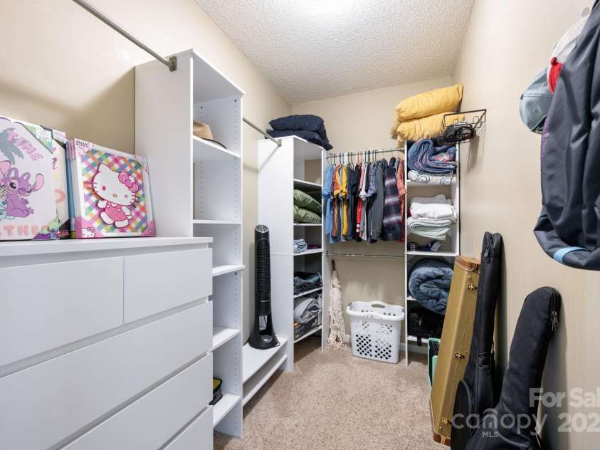 207 Farm Creek Drive, Asheville, NC 28806.  MLS# CAR4320360, YatesRealty ID 20088. Roomy walk-in closet.