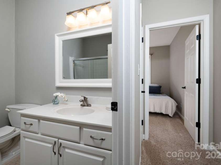 207 Farm Creek Drive, Asheville, NC 28806.  MLS# CAR4320360, YatesRealty ID 20088. Shared full bathroom, and down the hall...