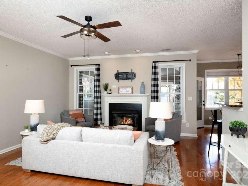 207 Farm Creek Drive, Asheville, NC 28806.  MLS# CAR4320360, YatesRealty ID 20088. Step inside to the living room and a layout that is connected yet has some separation.