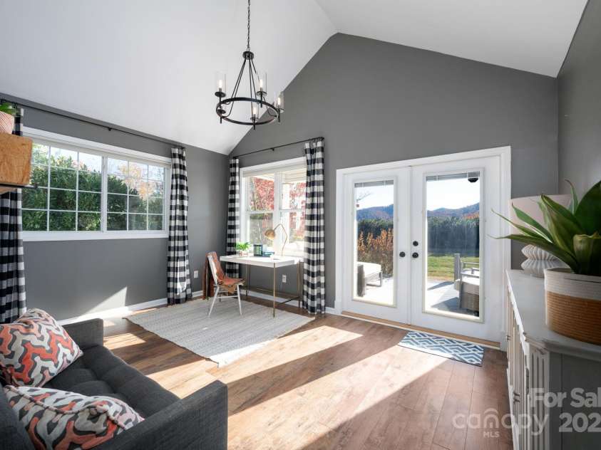 207 Farm Creek Drive, Asheville, NC 28806.  MLS# CAR4320360, YatesRealty ID 20088. Step into the sunroom which has its own HVAC unit.