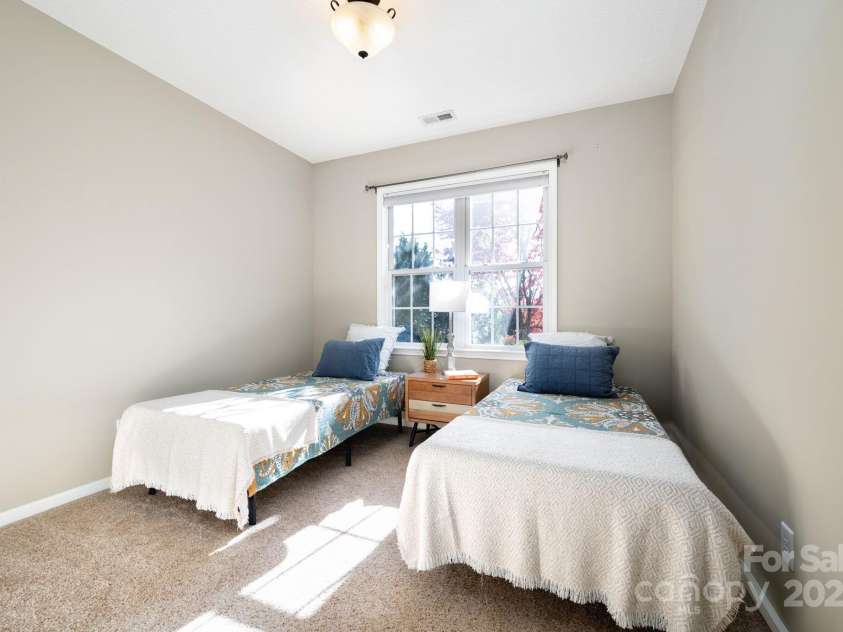 207 Farm Creek Drive, Asheville, NC 28806.  MLS# CAR4320360, YatesRealty ID 20088. ...to the rear guest bedroom.