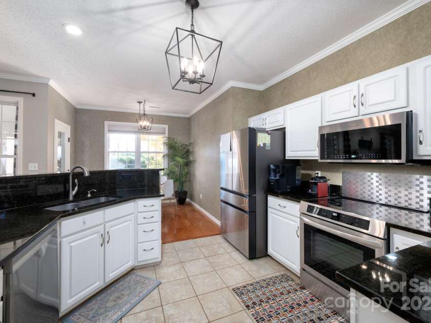 207 Farm Creek Drive, Asheville, NC 28806.  MLS# CAR4320360, YatesRealty ID 20088. Updated fixtures add flair.