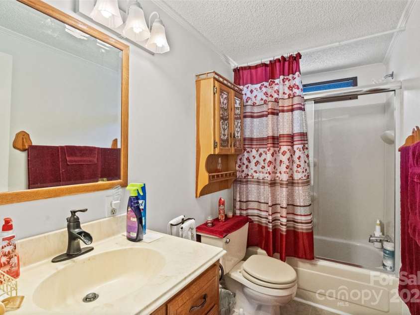 5909 Lake Valley Road, Clover, SC 29710.  MLS# CAR4288971, YatesRealty ID 2009. Bedroom #2 and #3 shared full bathroom