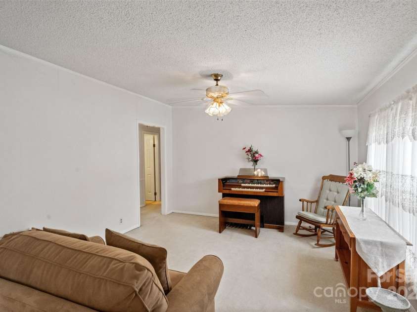 5909 Lake Valley Road, Clover, SC 29710.  MLS# CAR4288971, YatesRealty ID 2009. Hallway through this doorway to all 3 bedrooms