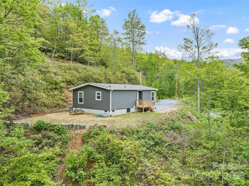 328 Mountain Lion Trail, Maggie Valley, NC 28751.  MLS# CAR4256030, YatesRealty ID 20091. 