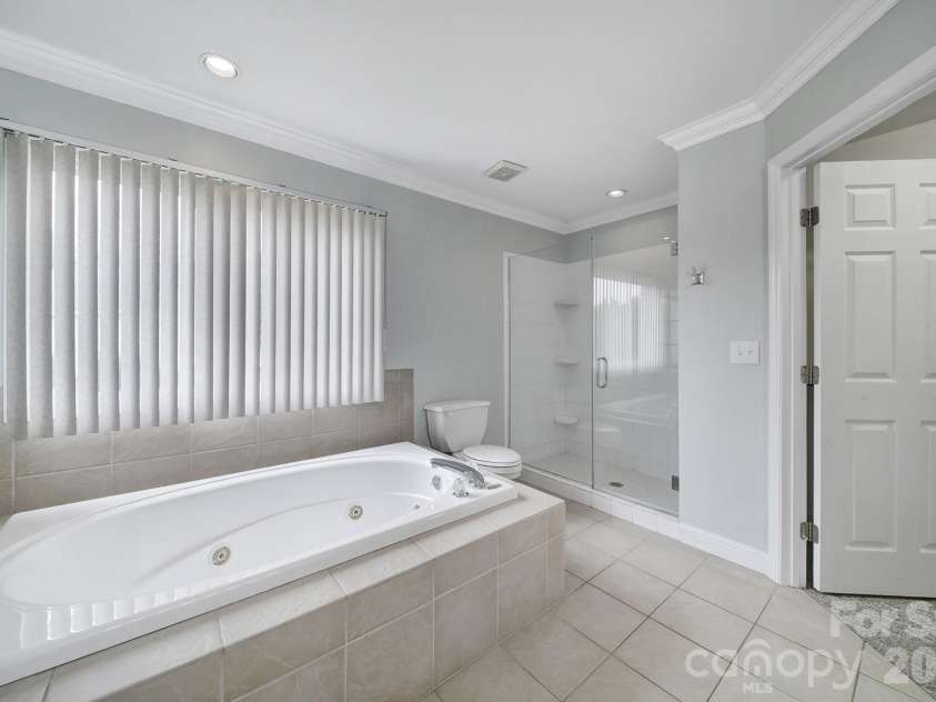 718 Emerson Drive, Mooresville, NC 28115.  MLS# CAR4325279, YatesRealty ID 20096. Primary Bathroom
