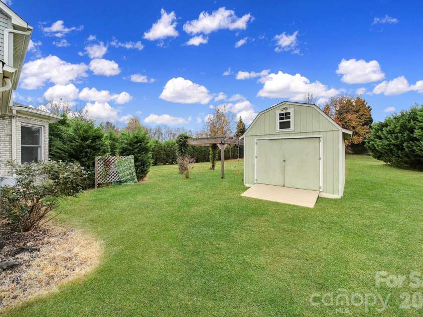 718 Emerson Drive, Mooresville, NC 28115.  MLS# CAR4325279, YatesRealty ID 20096. Storage Shed