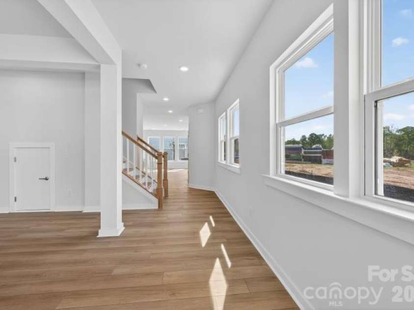 10110 Mamillion Drive, Huntersville, NC 28078.  MLS# CAR4327406, YatesRealty ID 20101. Open Flex Space - End Unit windows