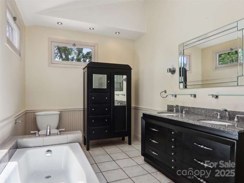 27 Alabama Avenue, Weaverville, NC 28787.  MLS# CAR4263358, YatesRealty ID 20101. Primary bath
