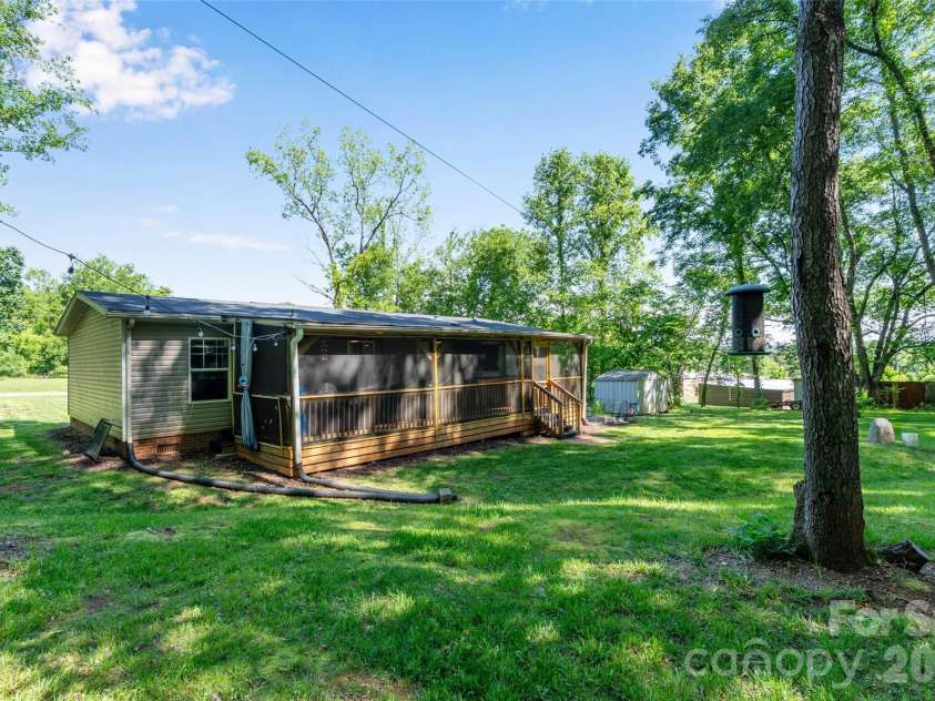 5007 Carlos Road, Catawba, NC 28609.  MLS# CAR4375298, YatesRealty ID 20104. Rear view of home and covered deck