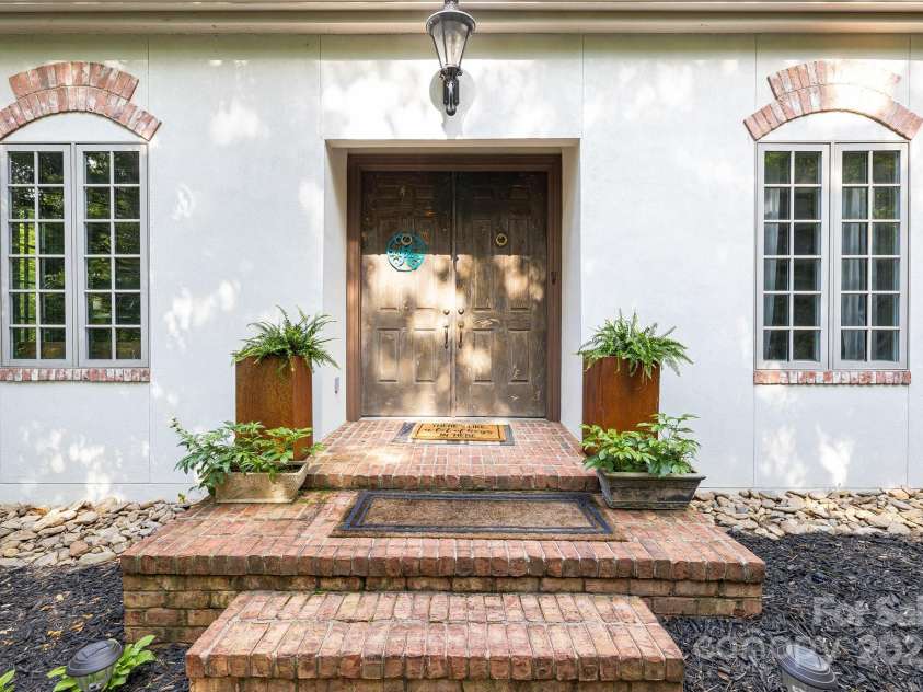 280 Sweetwater Hills Drive, Hendersonville, NC 28791.  MLS# CAR4268541, YatesRealty ID 20114. 