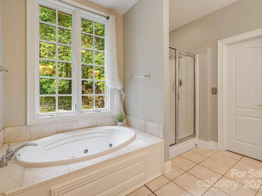 280 Sweetwater Hills Drive, Hendersonville, NC 28791.  MLS# CAR4268541, YatesRealty ID 20114. 