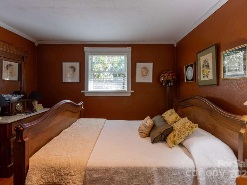 26 Kitazuma Road, Black Mountain, NC 28711.  MLS# CAR4199228, YatesRealty ID 20115. Bedroom 3 has built-in closet area.