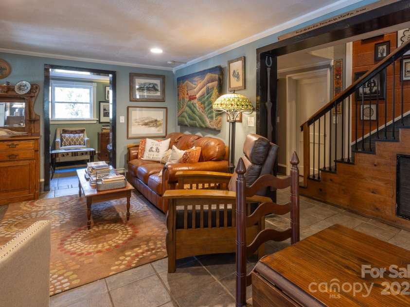 26 Kitazuma Road, Black Mountain, NC 28711.  MLS# CAR4199228, YatesRealty ID 20115. Looking from Kitchen to Living Room.