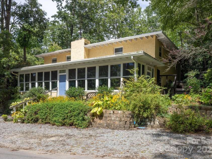 26 Kitazuma Road, Black Mountain, NC 28711.  MLS# CAR4199228, YatesRealty ID 20115. Parking for 4 cars!  Blooming easy to maintain Perennial Gardens