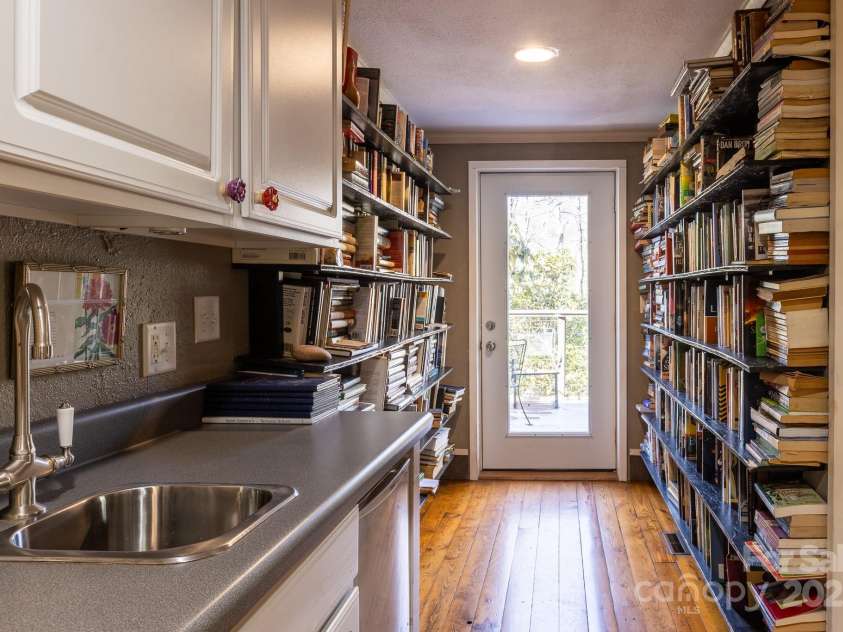 26 Kitazuma Road, Black Mountain, NC 28711.  MLS# CAR4199228, YatesRealty ID 20115. Upstairs Wet Bar and Built In Shelving. Door exits to deck #2