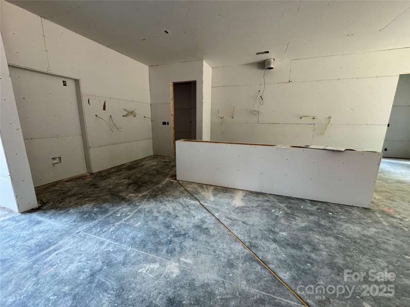 5427 Addison Drive, Charlotte, NC 28211.  MLS# CAR4258446, YatesRealty ID 20122. Kitchen will have warm sleek cabinetry, quartz waterfall island, under cabinet lighting,& panel ready appliances