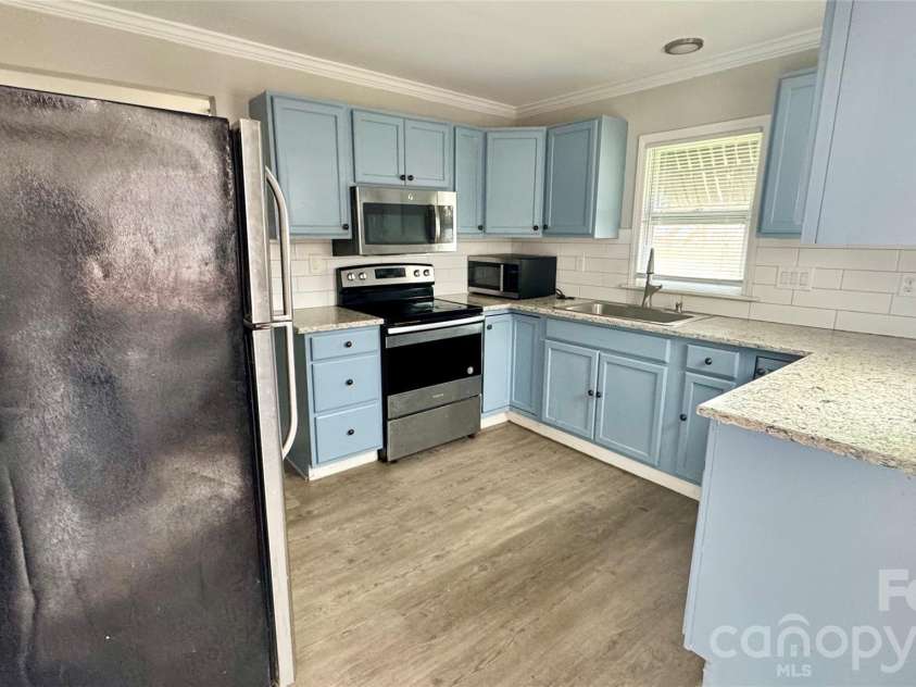 2001 Lane Street, Kannapolis, NC 28083.  MLS# CAR4353328, YatesRealty ID 20124. 