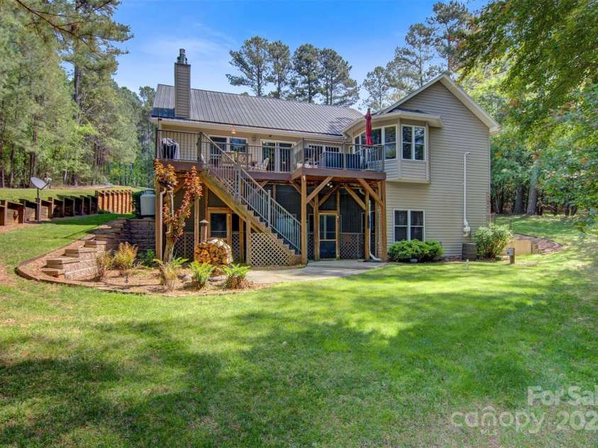 5690 Anchor Drive, Granite Falls, NC 28630.  MLS# CAR4252807, YatesRealty ID 20124. Back view of this home-much larger than you think!