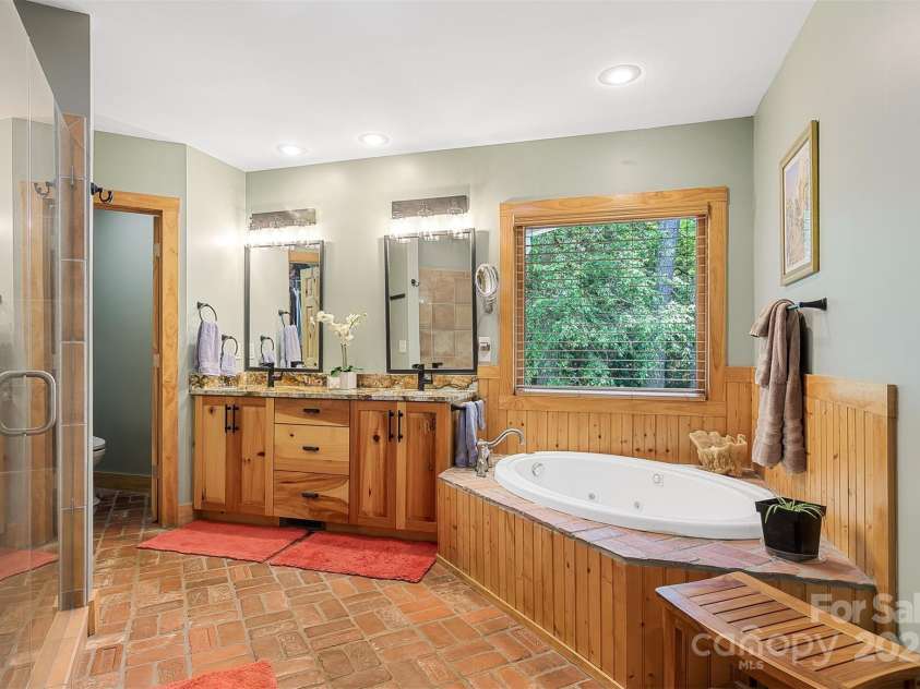 5690 Anchor Drive, Granite Falls, NC 28630.  MLS# CAR4252807, YatesRealty ID 20124. Dual Vanities, private toilet room.