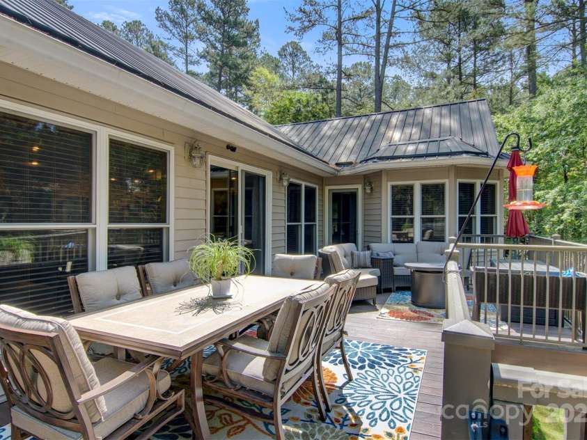 5690 Anchor Drive, Granite Falls, NC 28630.  MLS# CAR4252807, YatesRealty ID 20124. Large composite deck is perfect for enjoying outdoor dining.