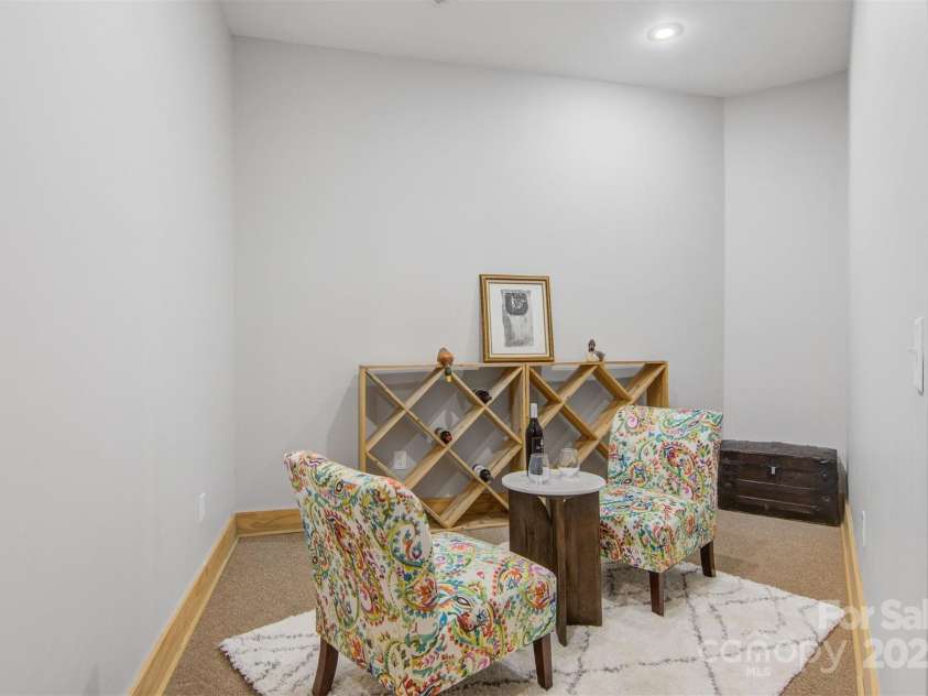 5690 Anchor Drive, Granite Falls, NC 28630.  MLS# CAR4252807, YatesRealty ID 20124. Nook area at foot of the stairs.