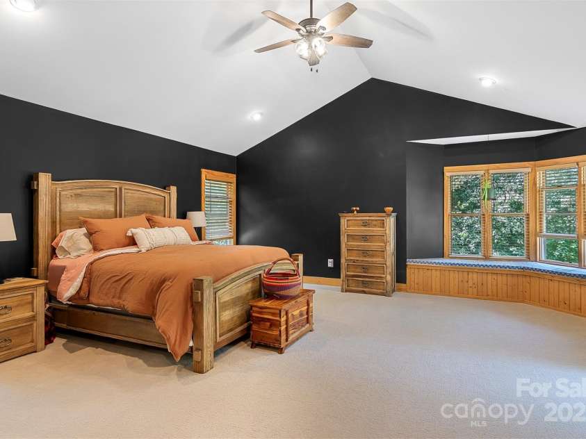 5690 Anchor Drive, Granite Falls, NC 28630.  MLS# CAR4252807, YatesRealty ID 20124. Primary Suite features an expanse of windows bringing in natural light and views of the back yard. New carpet and paint.