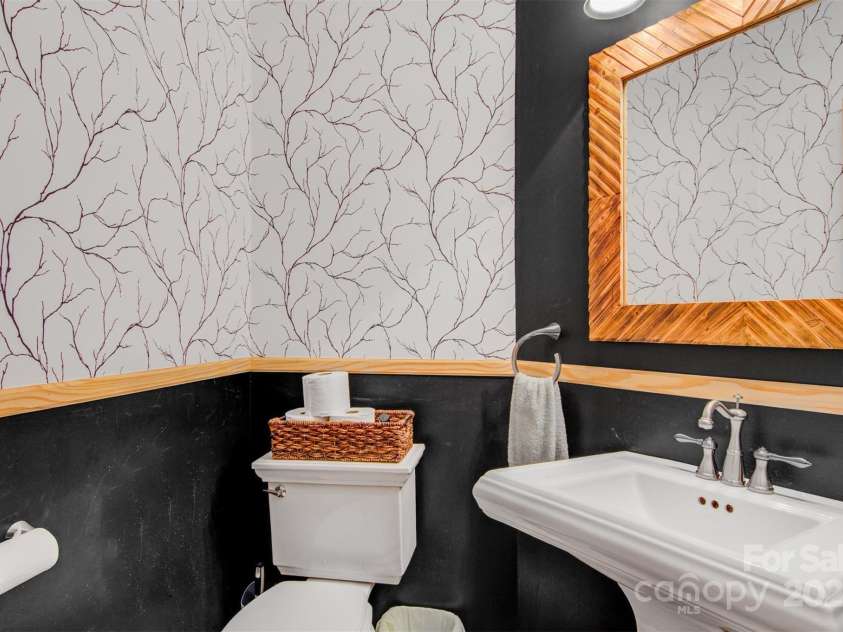 5690 Anchor Drive, Granite Falls, NC 28630.  MLS# CAR4252807, YatesRealty ID 20124. Redecorated half bath.