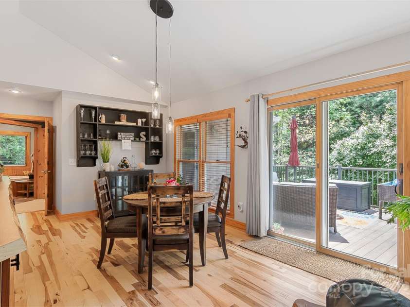 5690 Anchor Drive, Granite Falls, NC 28630.  MLS# CAR4252807, YatesRealty ID 20124. Sliding Glass Door to deck offers views of wooded back yard and seasonal views of the lake and the pond.