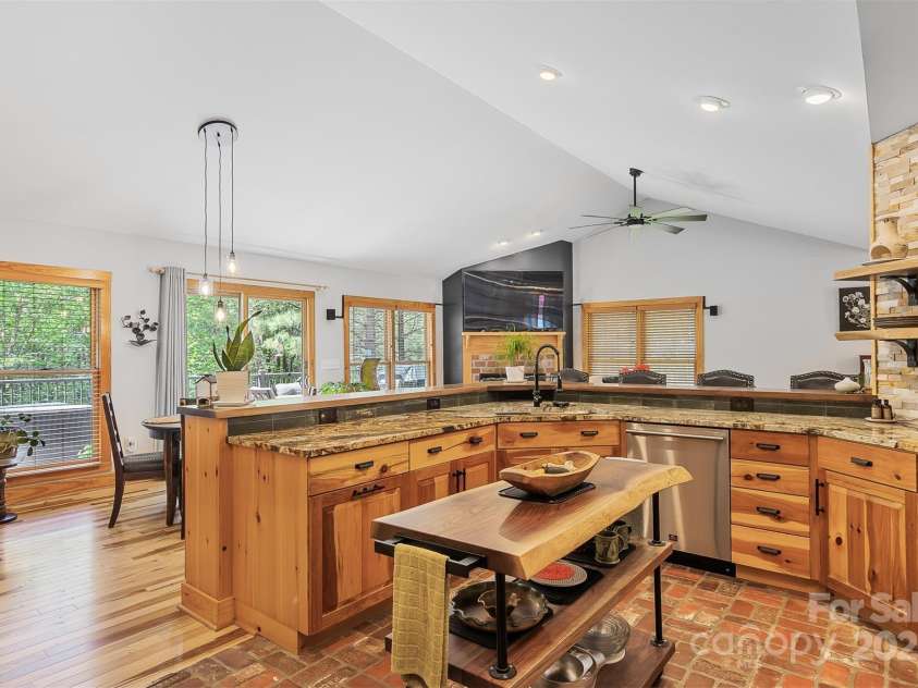 5690 Anchor Drive, Granite Falls, NC 28630.  MLS# CAR4252807, YatesRealty ID 20124. SS Kitchen appliances remain: new Forno Gas Range, Hood and Dishwasher. Bosch Refrigerator included.