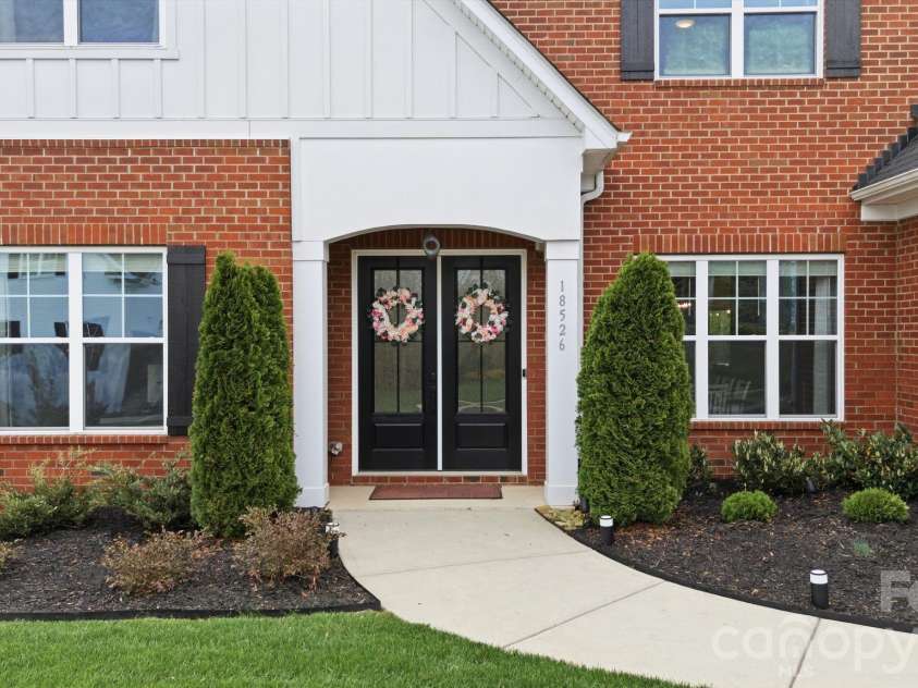 18526 Doves Crest Road, Cornelius, NC 28031.  MLS# CAR4364782, YatesRealty ID 20125. Front Porch 
