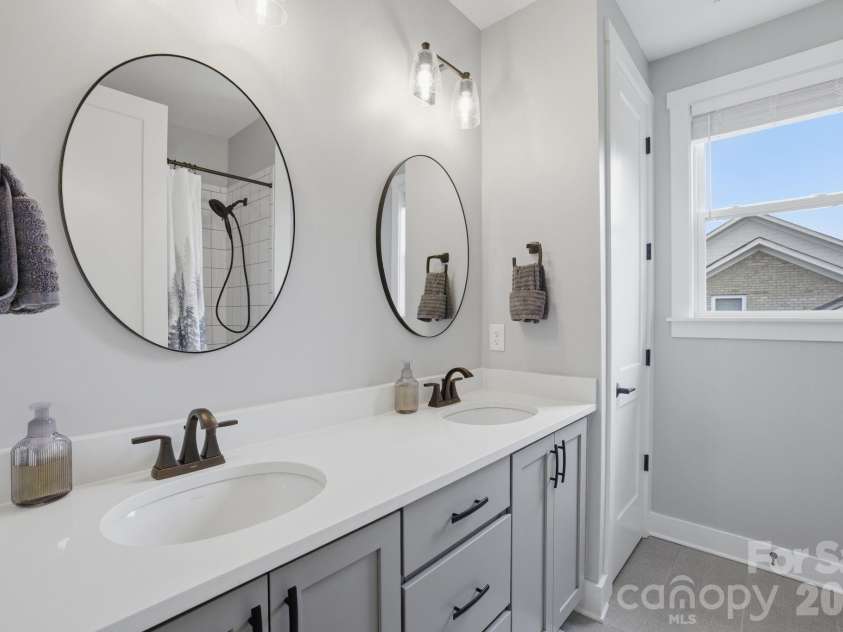 18526 Doves Crest Road, Cornelius, NC 28031.  MLS# CAR4364782, YatesRealty ID 20125. Hallway Full Bathroom 
