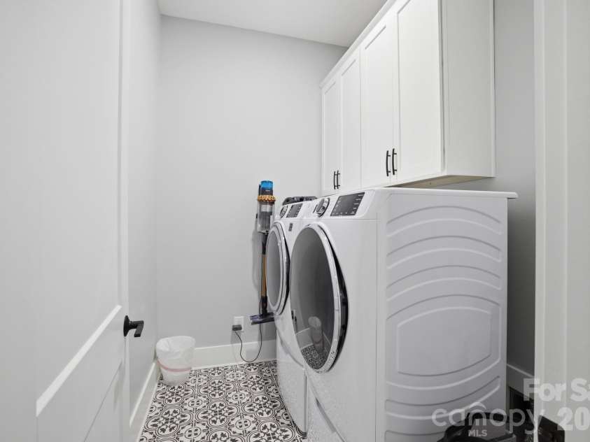 18526 Doves Crest Road, Cornelius, NC 28031.  MLS# CAR4364782, YatesRealty ID 20125. Laundry Room 