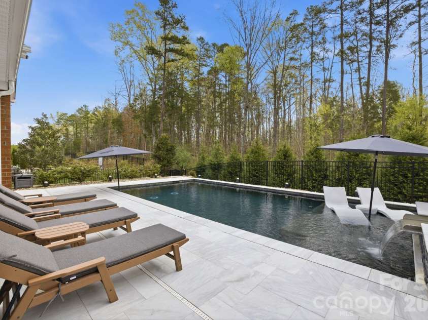 18526 Doves Crest Road, Cornelius, NC 28031.  MLS# CAR4364782, YatesRealty ID 20125. Pool and Spa