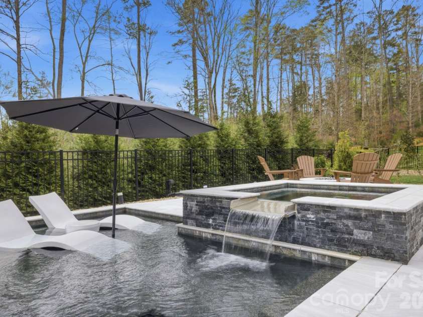 18526 Doves Crest Road, Cornelius, NC 28031.  MLS# CAR4364782, YatesRealty ID 20125. Pool and Spa