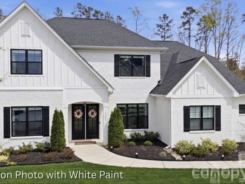18526 Doves Crest Road, Cornelius, NC 28031.  MLS# CAR4364782, YatesRealty ID 20125. Representation photo showing the house painted white. 