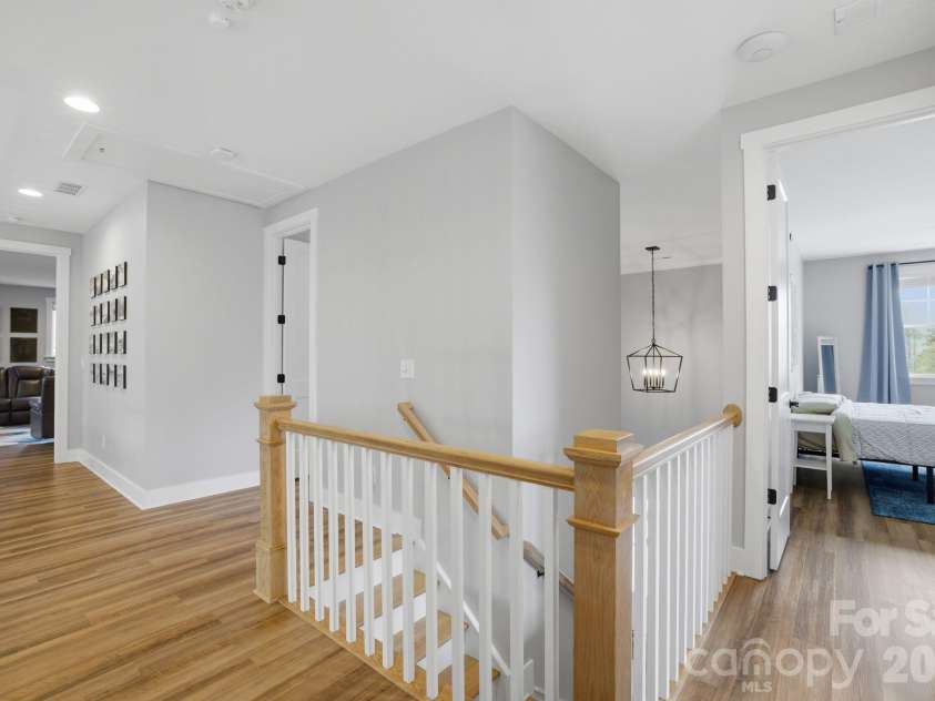 18526 Doves Crest Road, Cornelius, NC 28031.  MLS# CAR4364782, YatesRealty ID 20125. Upstairs Hallway