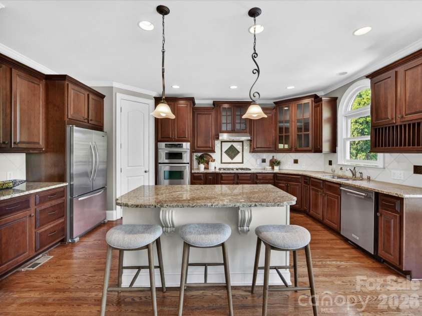404 Three Greens Drive, Huntersville, NC 28078.  MLS# CAR4369086, YatesRealty ID 20127. 
