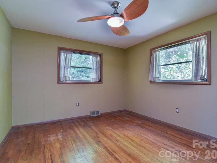 1 Hillcrest Lane, Black Mountain, NC 28711.  MLS# CAR4368421, YatesRealty ID 20131. Bedroom #1