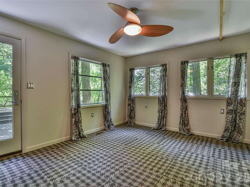 1 Hillcrest Lane, Black Mountain, NC 28711.  MLS# CAR4368421, YatesRealty ID 20131. Bonus room opens to the private deck