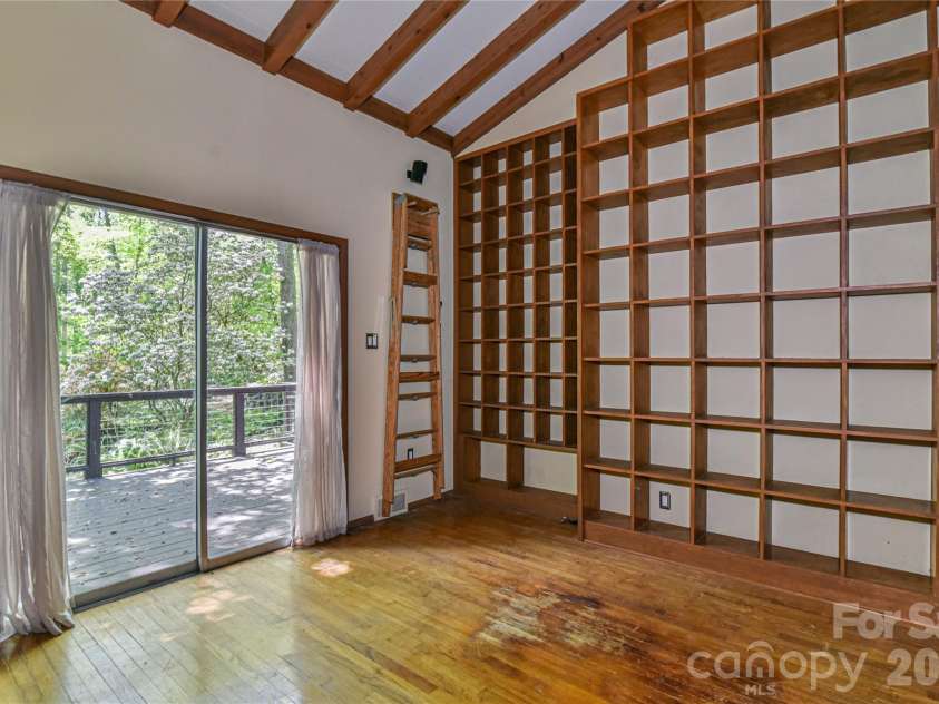 1 Hillcrest Lane, Black Mountain, NC 28711.  MLS# CAR4368421, YatesRealty ID 20131. Books and artifacts are welcome