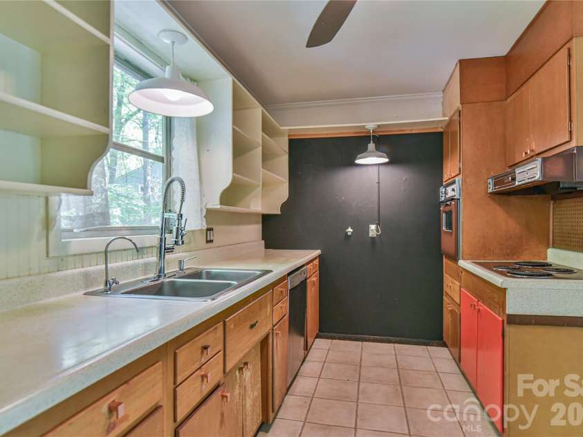 1 Hillcrest Lane, Black Mountain, NC 28711.  MLS# CAR4368421, YatesRealty ID 20131. Step saving kitchen