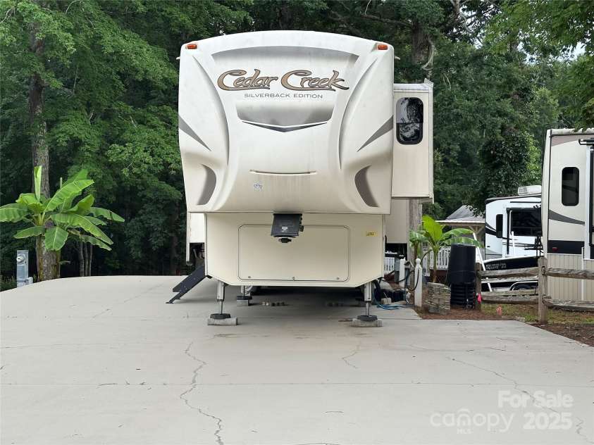 104 Cardinal Drive, New London, NC 28127.  MLS# CAR4271571, YatesRealty ID 20136. 