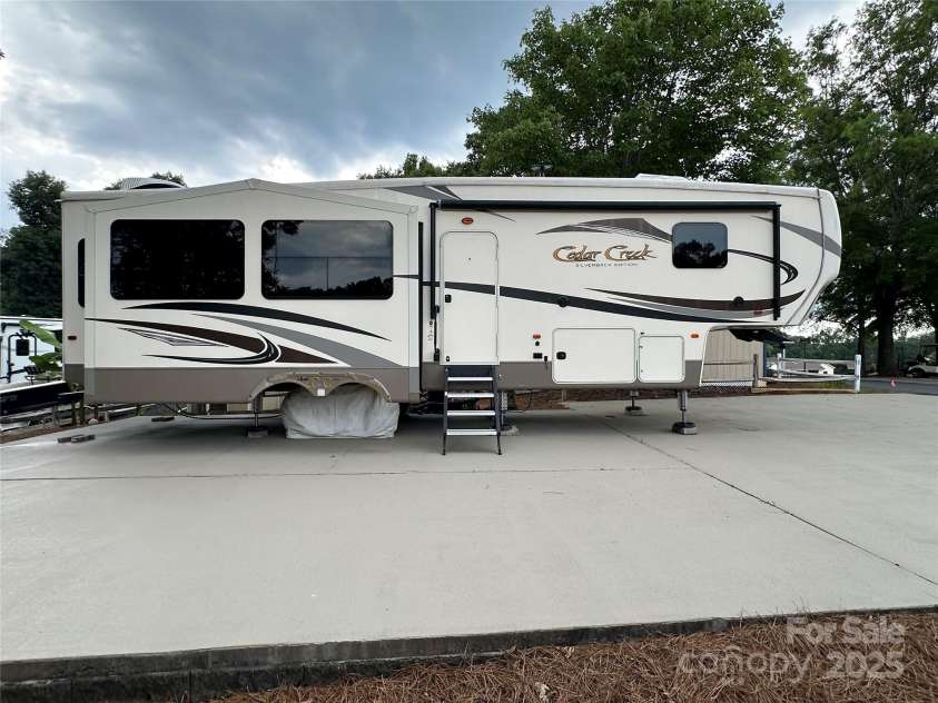 104 Cardinal Drive, New London, NC 28127.  MLS# CAR4271571, YatesRealty ID 20136. 