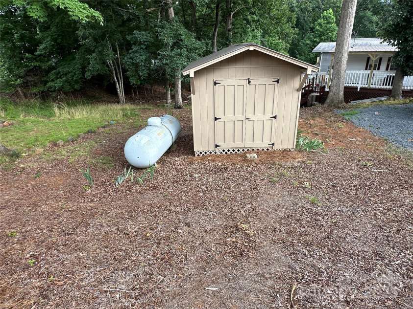 104 Cardinal Drive, New London, NC 28127.  MLS# CAR4271571, YatesRealty ID 20136. 