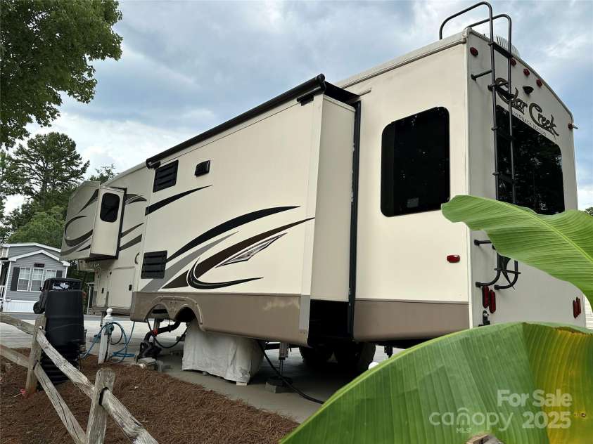 104 Cardinal Drive, New London, NC 28127.  MLS# CAR4271571, YatesRealty ID 20136. 