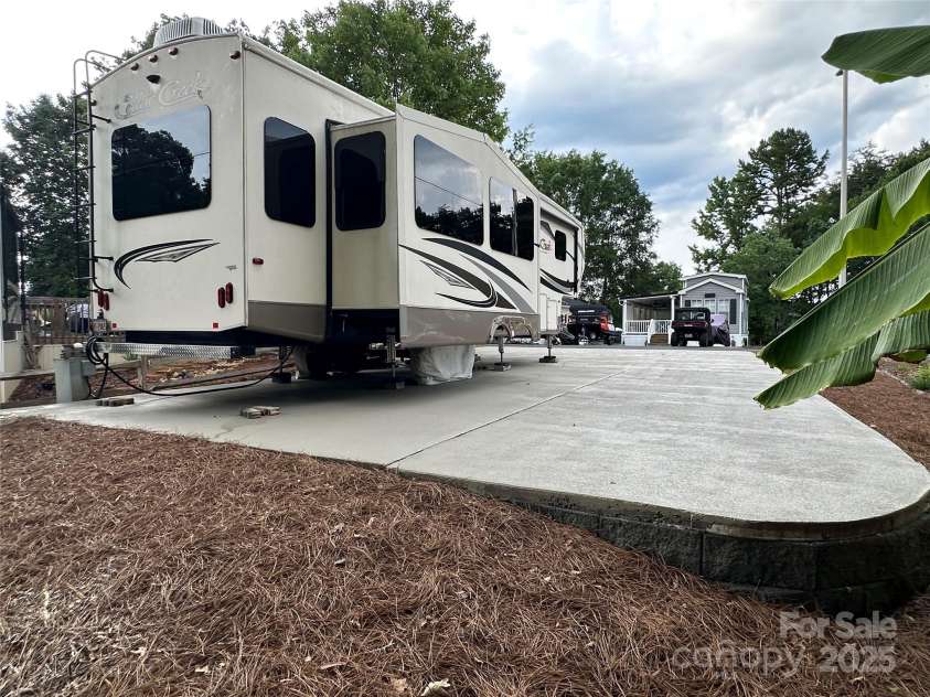 104 Cardinal Drive, New London, NC 28127.  MLS# CAR4271571, YatesRealty ID 20136. 