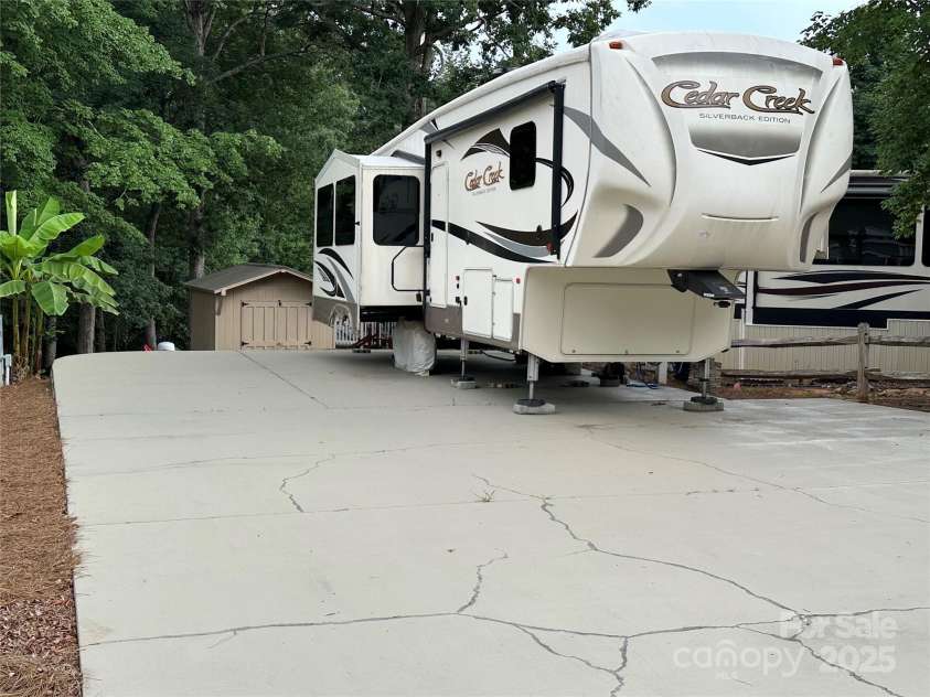 104 Cardinal Drive, New London, NC 28127.  MLS# CAR4271571, YatesRealty ID 20136. 