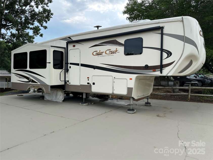 104 Cardinal Drive, New London, NC 28127.  MLS# CAR4271571, YatesRealty ID 20136. 