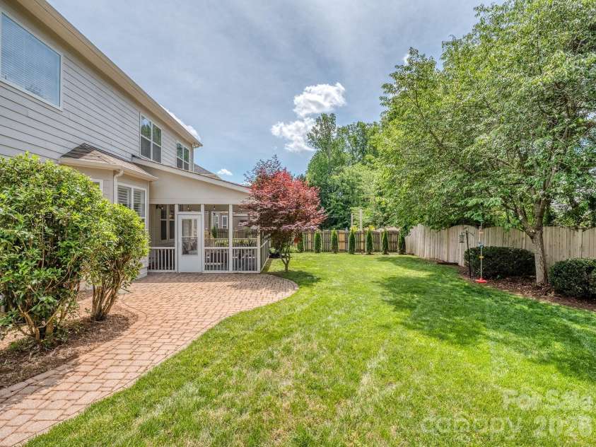 2008 Shalford Lane, Matthews, NC 28104.  MLS# CAR4364592, YatesRealty ID 20137. Back patio
